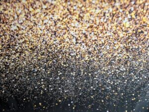 Fotobox mieten 43 Funkelnder goldener Glitter für Eventdekorationen, festliche Atmosphäre und besondere Anlässe. Perfekt für Stimmung, Bühnen- und Partygestaltung bei Events, Hochzeiten und Feiern.